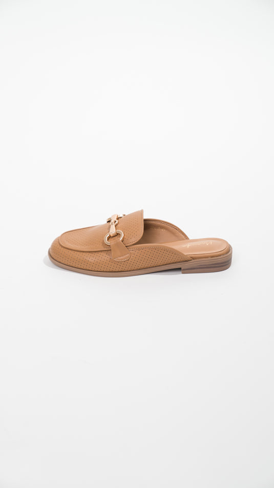 Manuella camel mules with buckles, showcasing stylish design and comfortable fit, set against a neutral background.