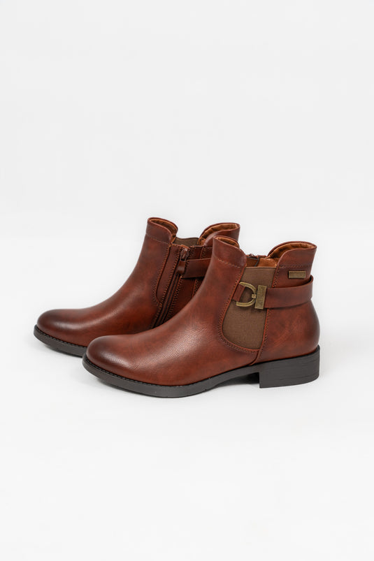 Bottines plates avec boucles et élastiques