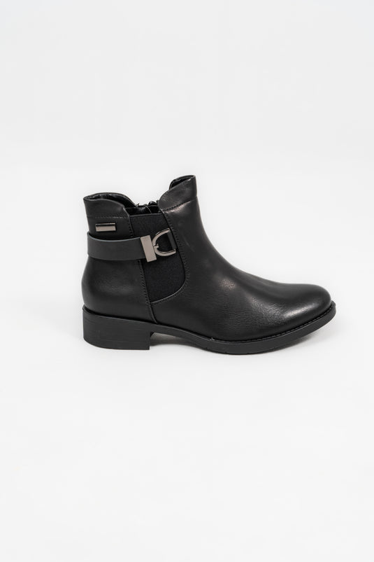 Bottines plates avec boucles et élastiques